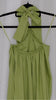 Green halter neck dress on a hanger against a white background