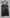 Black leather dress with braided straps on a hanger against a plain background