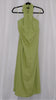 Green halter neck dress on a hanger against a white background