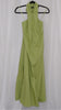 Green halter neck dress on a hanger against a white background